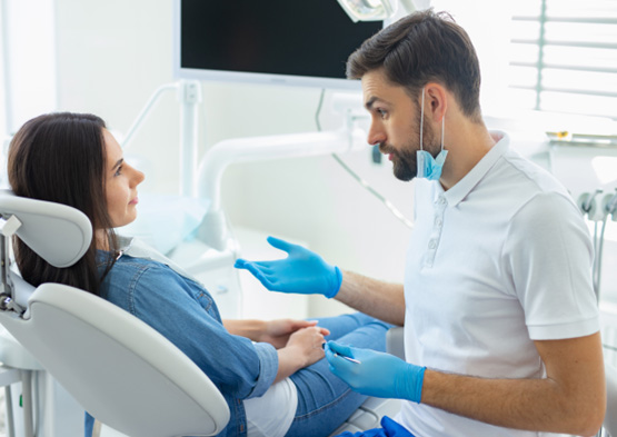 Patient talking to periodontist about Elemental Perioplast