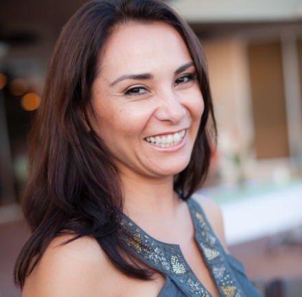 Woman smiling after periodontal treatment with sedation dentistry